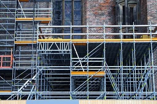 Yobs caught climbing scaffolding in  London